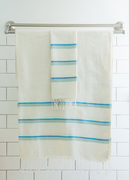 http://boleroadtextiles.com/cdn/shop/products/Bole_Road_Textiles_Bath_Towels_Blue_Stripes_2_grande.jpg?v=1553089182