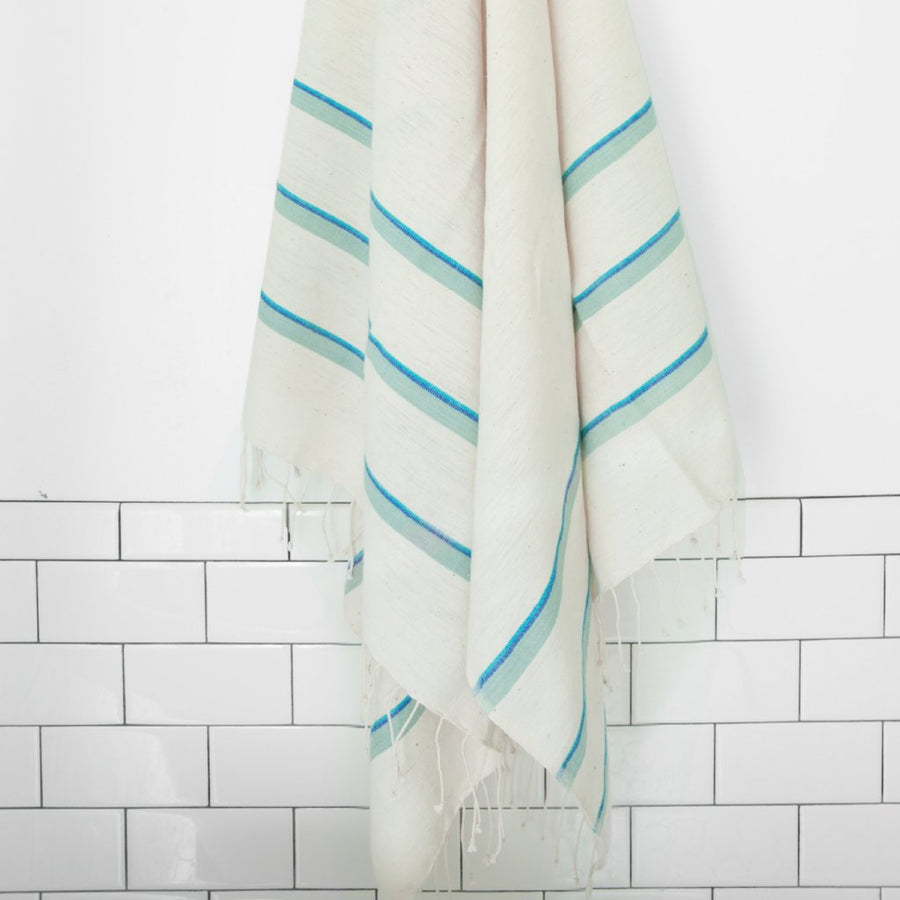 https://boleroadtextiles.com/cdn/shop/products/Bole_Road_Textiles_Bath_Towel_Blue_2_900x.jpg?v=1553089182